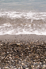 Pebble beach stone coastline close up view