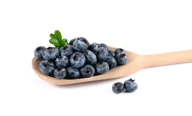 Wooden spoon with blueberries