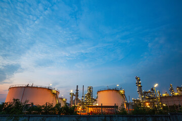 Twilight scene of tank oil refinery plant and tower column of Petrochemistry industry