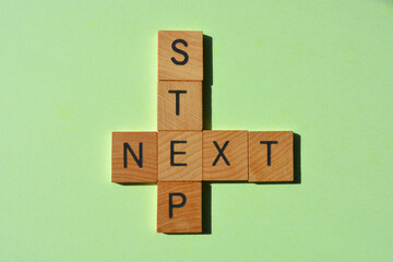 Fototapeta premium Next, Step, words as crossword 