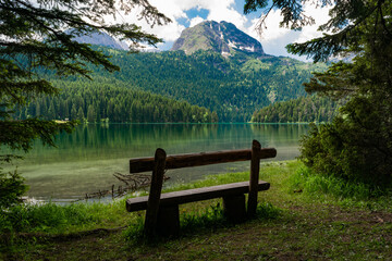 Wooden bench near Glacial Black Lake. Durmitor National Park. Montenegro