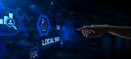 Local seo internet marketing concept. Businessman pressing button on screen.