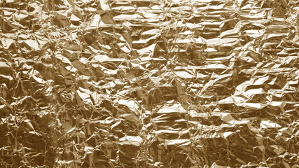 Shiny yellow gold foil abstract texture background