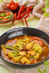 Cap cai, sometimes spelled cap cay is mixed vegetables the Hokkien-derived term for a popular Chinese Indonesian and Peranakan stir-fried vegetable dish that originates from Fujian cuisine