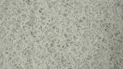 Sponge Scourer pad in grey color for texture and back ground.