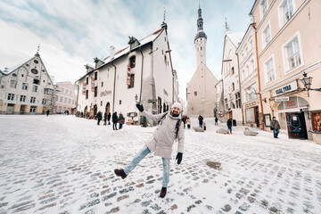male tourist outdoors in winter in the old town of Tallinn.Estonia