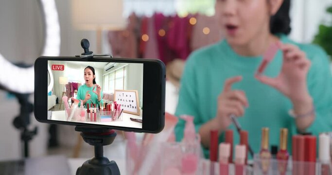 Asia woman micro influencer record live viral video camera at home studio. Happy youtuber fun talk speak advice review hobby in media. Vlogger selfie shoot enjoy work show smile teach like share app.