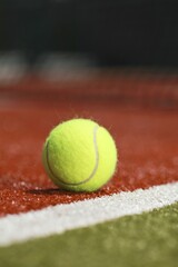 Tennis ball on a tennis court