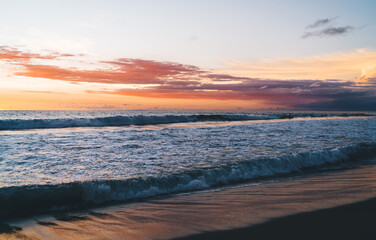 Fototapeta premium Stormy sea waves washing sandy coast