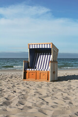 wicker beach chairs on the Baltic Sea coast