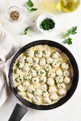 Swedish meatballs with white creamy sauce