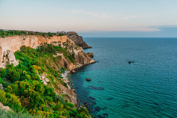 Fototapeta premium Amazing landscape at sunset, rocks and the sea on Cape Fiolent in Crimea.