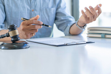 Attorney or Judge gavel with Justice lawyers, Business man  or lawyer working on a documents. Legal law and is consulting and legal advice, advice and justice concept.