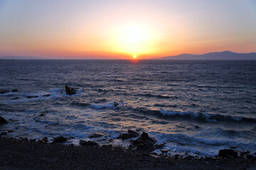 Sunset in beautiful Greek island Mykonos in Greece.