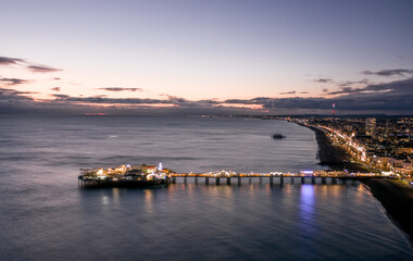 Blue Hour Over Brighton's Palace Pier and West Pier Aerial View