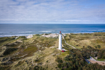 Lighthouse on the Lyngvig Fyr Dunes of Northern Denmark - obrazy, fototapety, plakaty