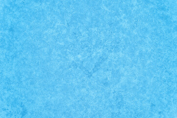 Natural texture of blue ice with white veins. Winter background