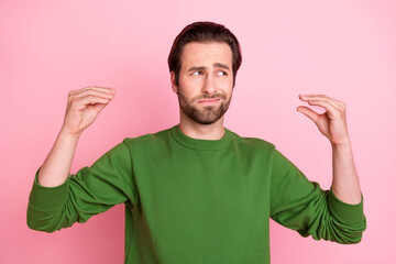 Portrait of unsatisfied person arms fingers show bla blah look empty space isolated on pink color...