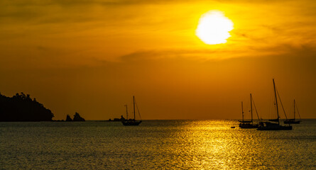 Fototapeta na wymiar The most beautiful colorful sunset Koh Phayam Beach Ranong Thailand.