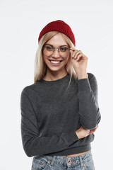 Smiling european girl in glasses looking at camera