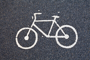 bicycle road sign on asphalt closeup
