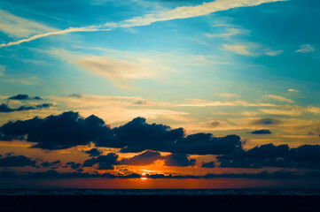 Sunset at the sea. Beautiful sunset sky. Colorful natural background.