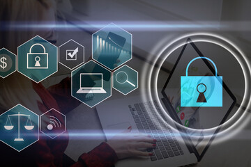 Person using a laptop computer with technology cybersecurity and privacy concept. protection and safe data for global network security