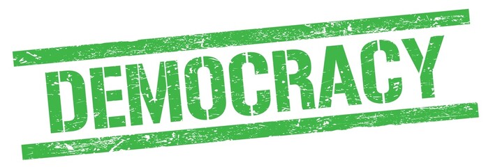 DEMOCRACY text on green grungy rectangle stamp.