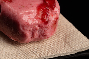 Strawberry ice cream on ceramic plate