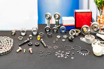 various industrial metal parts e.g. bearing ball chain connector joint ring gasket internal external retaining etc. on table