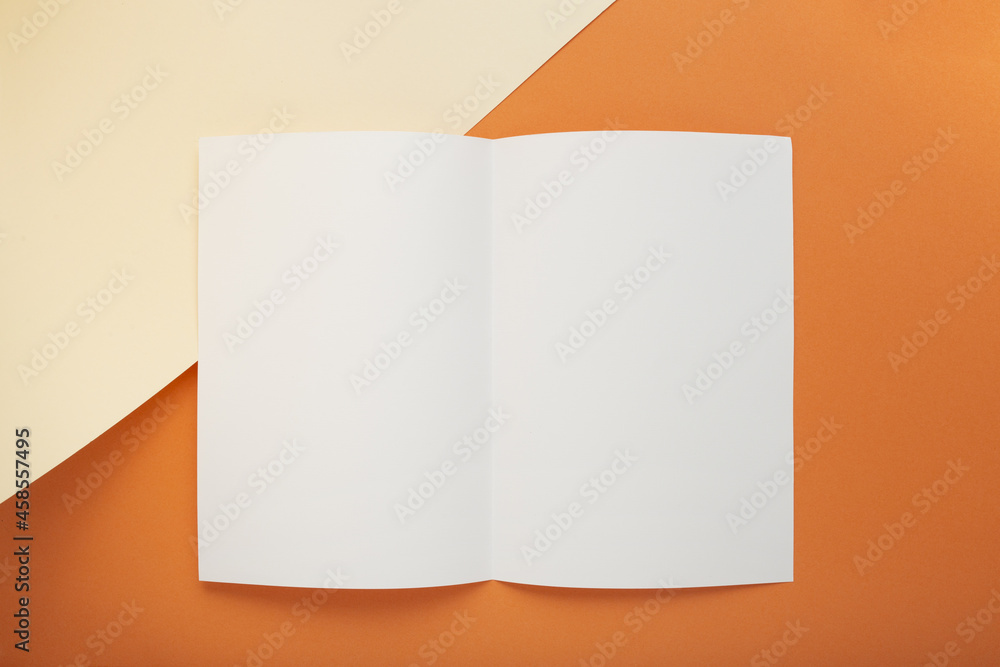 Poster composition with geometric patterns with pastel colors and an empty white page with copy space