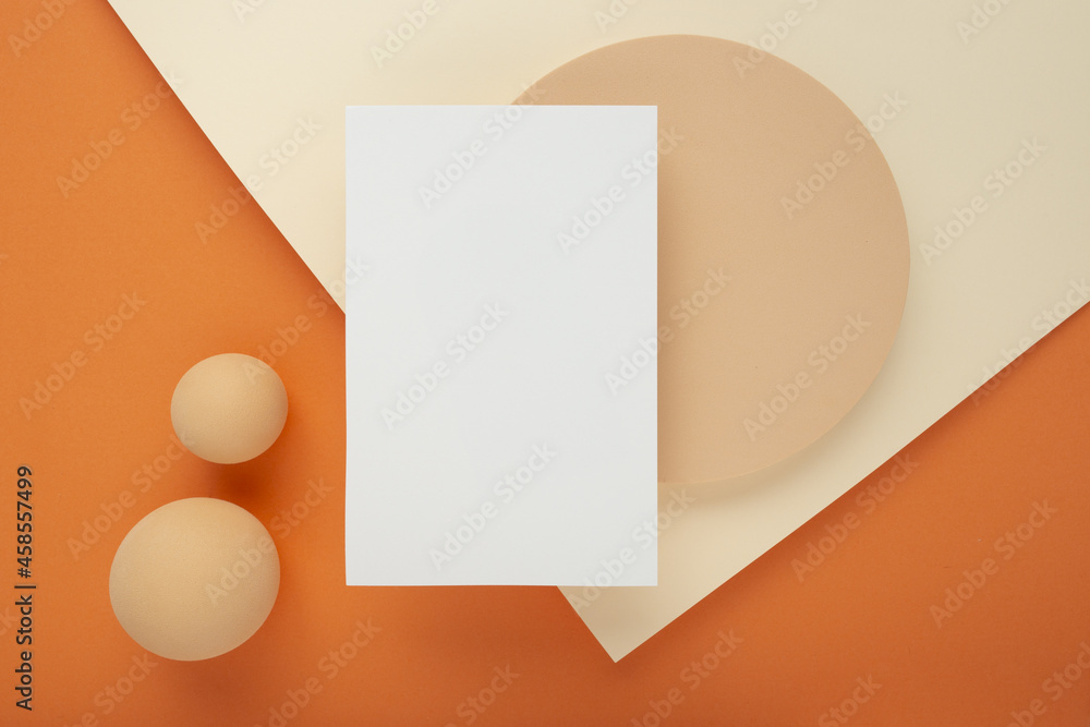 Poster composition with geometric patterns with pastel colors and an empty white frame with copy space