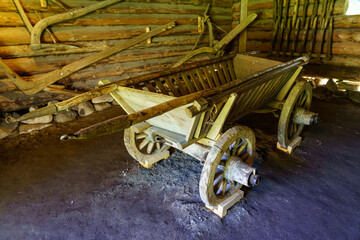 old wooden cart for transporting materials in the field.