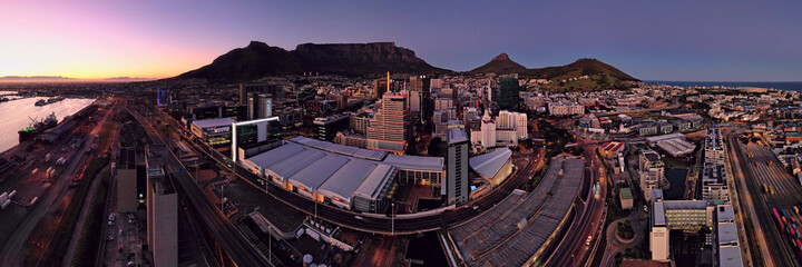 Fototapeta premium Aerial twilight panoramic view of the City of Cape Town, Western Province, South Africa. 18 September 2021.