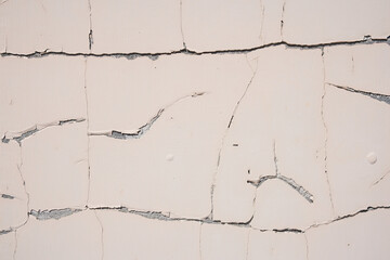 Overlay for your design. Background texture of a white cement wall with a crack. A crack in the old wall. High quality photo