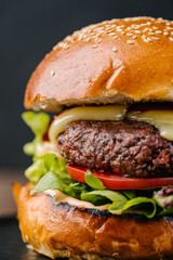 fresh tasty meat free burger on wooden table. close-up