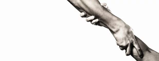 Fotobehang Close up help hand. Helping hand concept, support. Helping hand outstretched, isolated arm, salvation. Two hands, helping arm of a friend, teamwork. Rescue, helping gesture or hands. Copy space © Yevhen