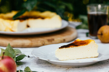 Basque burnt cheesecake served outside on white plate