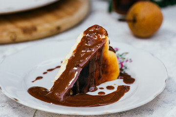 Basque burnt cheesecake served outside on white plate
