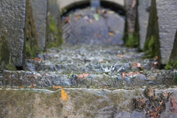 a beautifully constructed waterfall that flows harmoniously through the city park. -V2

located at the 