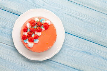 Birthday cake on wooden table