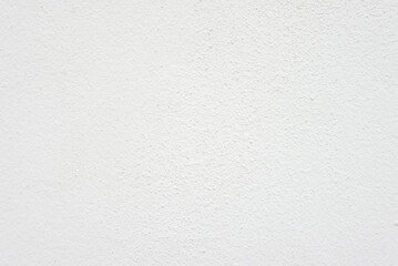 Seamless texture of white cement wall a rough surface, with space for text, for a background..