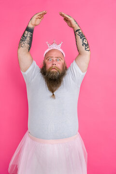 Funny fat man dressed like ballerina