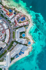 Aerial top view of Cancun beach and city hotel zone in Mexico. Caribbean coast landscape of Mexican resort with beach Playa Caracol and Kukulcan road. Riviera Maya in Quintana roo region on Yucatan - obrazy, fototapety, plakaty