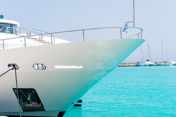 Shiny bell on the bow of the yacht close-up
