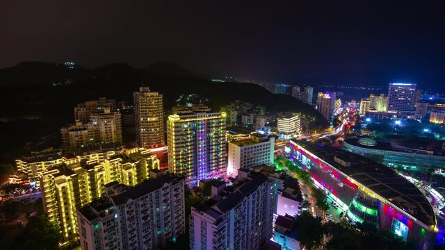 night illuminated sanya famous dadonghai beach town rooftop panorama timelapse 4k hainan island china