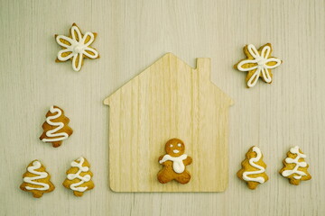  Fresh baked homemade cookies. New Year holiday composition of decorations. Christmas background with handmade gingerbread. Top view, copy space, flat lay.	