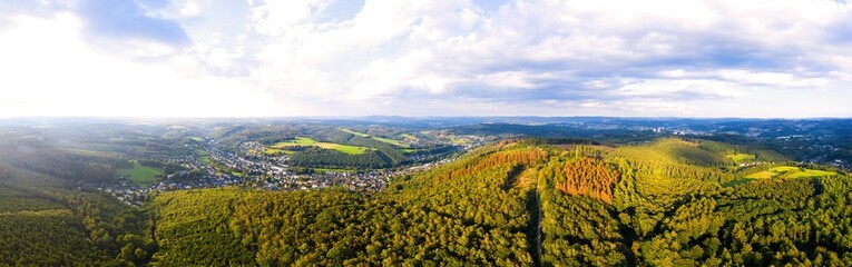 Fototapeta na wymiar the landscape of the siegerland with the city siegen in the background panorama