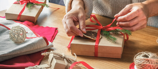 Christmas gift zero waste, eco friendly hand made box packaging gifts in kraft paper wooden table,...