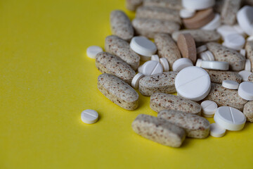 Fototapeta na wymiar heap of different pills background